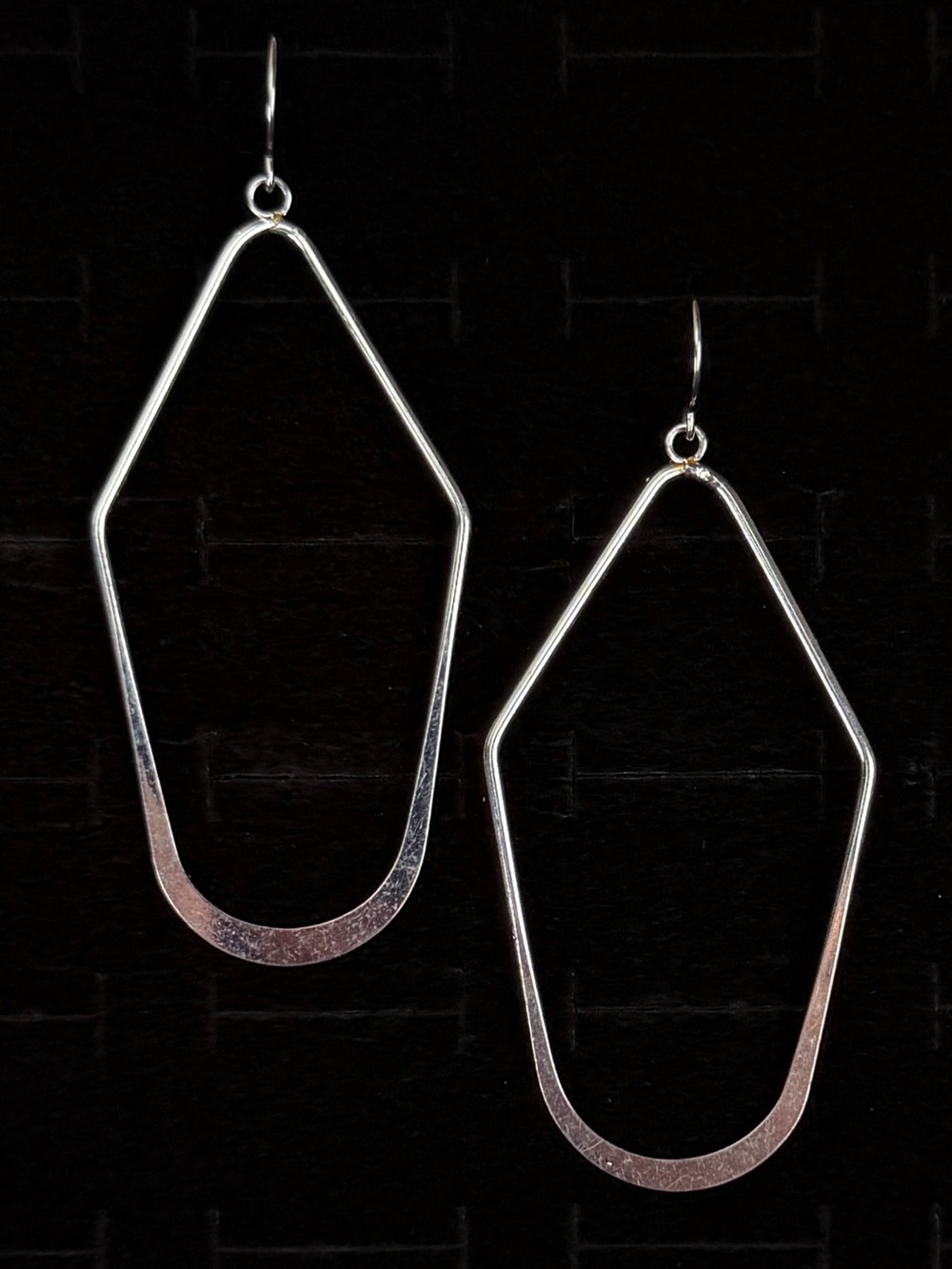 Pretty simplistic Silvertone long costume pierced earrings